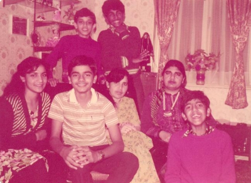 Qasim on his first pleasure trip to U.K. in 1983, aged 13 years, here with his Chachis and Cousins.