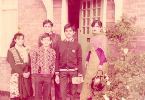 Qasim on his first pleasure trip to U.K. in 1983, aged 13 years, here with his Chachis and Cousins.