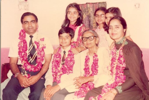 With his Grandmother, phuppi and family, celebrating his selection at Cadet College Hasan Abdal.