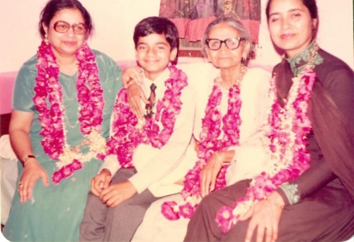 Qasim celebrates his selection for CCH in 1987 with his Grandmother, mother and Phuppi.